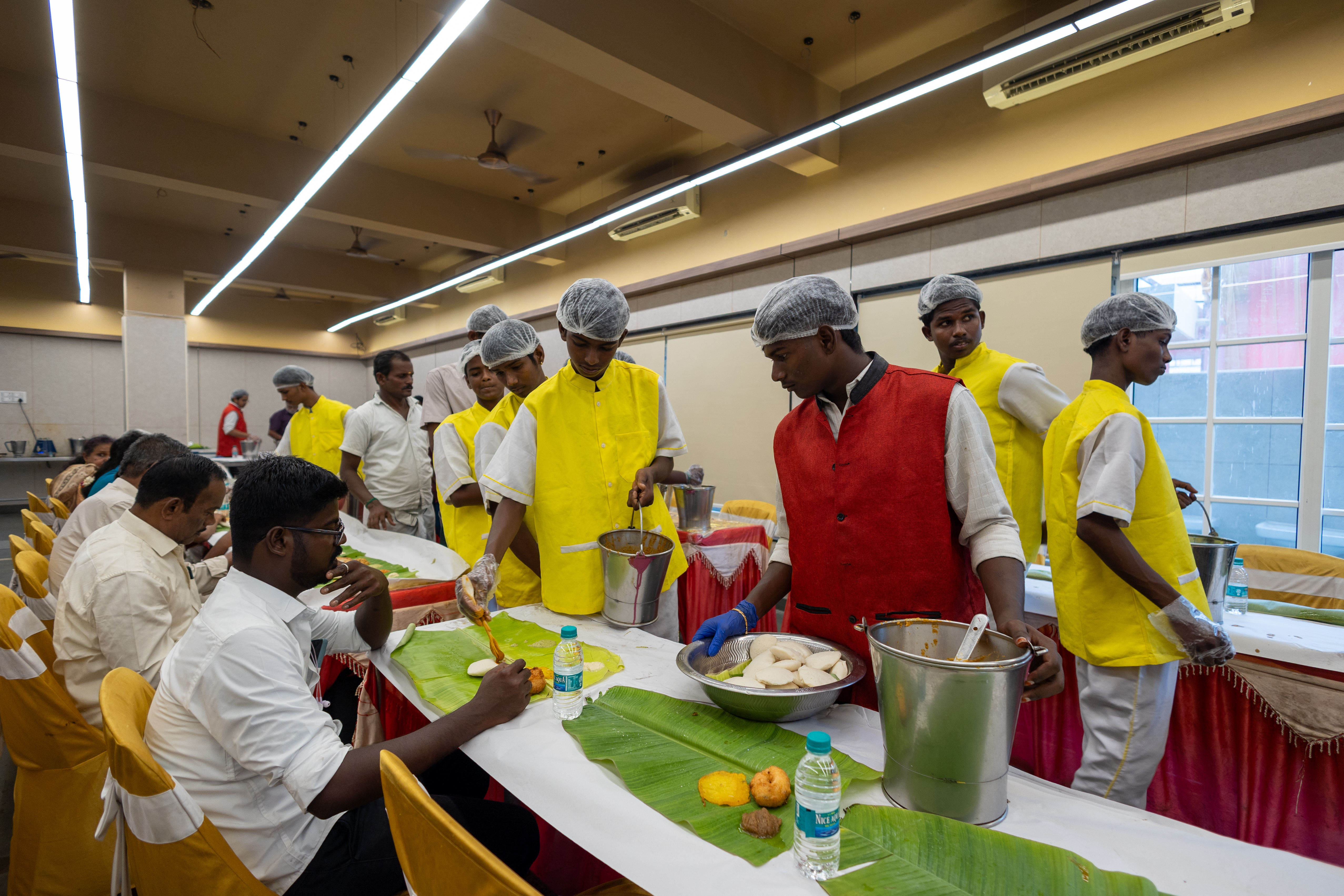 Serving guests at ceremony